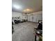 A spacious garage with a white door offers ample storage and organization space at 2077 Alki Beach Ave, Laughlin, NV 89029