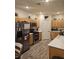 A spacious kitchen features stainless steel appliances, light wood cabinets, and ample counter space at 2077 Alki Beach Ave, Laughlin, NV 89029