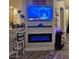 Inviting living room with fireplace, TV, and comfortable seating, perfect for relaxation and entertainment at 2077 Alki Beach Ave, Laughlin, NV 89029