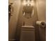 Compact powder room with a modern vanity, ideal for quick and convenient use by guests at 2077 Alki Beach Ave, Laughlin, NV 89029