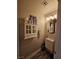 Stylish powder room with decorative accents, providing a chic and functional space for residents and guests at 2077 Alki Beach Ave, Laughlin, NV 89029