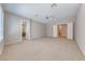 Large bedroom featuring a ceiling fan, recessed lighting, neutral carpet, and dual-door access at 2114 Twin Falls Dr, Henderson, NV 89044