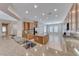 Bright kitchen with island and stainless appliances, seamlessly connected to the dining area at 2114 Twin Falls Dr, Henderson, NV 89044
