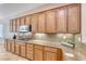 Spacious kitchen featuring granite countertops and modern appliances for cooking and entertaining at 2114 Twin Falls Dr, Henderson, NV 89044