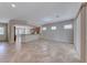 Spacious living room with tile flooring, natural light, and an open layout perfect for gatherings at 2114 Twin Falls Dr, Henderson, NV 89044