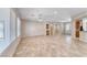 Bright and airy living room showcasing tile flooring, large windows, and an open layout at 2114 Twin Falls Dr, Henderson, NV 89044