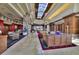 Grand lobby features soaring skylight, elegant furnishings, and sophisticated decor for a luxurious welcome at 2114 Twin Falls Dr, Henderson, NV 89044
