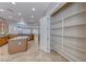 Walk-in pantry with built-in shelves provides ample storage adjacent to the spacious kitchen at 2114 Twin Falls Dr, Henderson, NV 89044