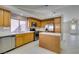 Modern kitchen with stainless steel appliances, tile counters, and ample cabinet space at 259 Baring Cross St, Henderson, NV 89074
