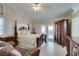 Inviting main bedroom with an en-suite bathroom and a ceiling fan at 259 Baring Cross St, Henderson, NV 89074
