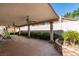 Covered patio with ceiling fans, pillars, and landscaped surroundings at 259 Baring Cross St, Henderson, NV 89074