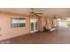 Covered patio with ceiling fans and a porch swing, perfect for relaxation at 259 Baring Cross St, Henderson, NV 89074