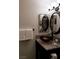 Bathroom featuring a vessel sink and decorative mirrors at 266 Lyra Ln, Las Vegas, NV 89110