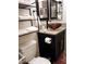 Bathroom featuring a vessel sink and decorative mirrors at 266 Lyra Ln, Las Vegas, NV 89110