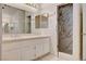Bathroom features a stand up shower, double sink, and marble accents at 2917 Broken Willow Cir, Las Vegas, NV 89117