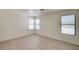 Bedroom featuring neutral walls and bright windows at 2917 Broken Willow Cir, Las Vegas, NV 89117