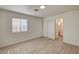 Bedroom with window, closet and view into the bathroom at 2917 Broken Willow Cir, Las Vegas, NV 89117