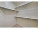 Walk in closet featuring built in shelving and neutral walls at 2917 Broken Willow Cir, Las Vegas, NV 89117