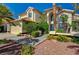 Charming home featuring a tile roof, desert landscaping, and an attached three car garage at 2917 Broken Willow Cir, Las Vegas, NV 89117
