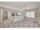 Modern kitchen with stainless steel appliances and a breakfast bar at 2917 Broken Willow Cir, Las Vegas, NV 89117