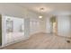 Open living space featuring plank floors and arched doorway at 2917 Broken Willow Cir, Las Vegas, NV 89117