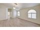 Bright living room with plank flooring and windows at 2917 Broken Willow Cir, Las Vegas, NV 89117