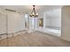 Bright living room featuring decorative columns, and new flooring at 2917 Broken Willow Cir, Las Vegas, NV 89117