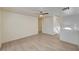 Bright living room featuring modern ceiling fan and wood flooring at 2917 Broken Willow Cir, Las Vegas, NV 89117