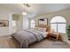Comfortable bedroom with neutral tones, modern decor, and ample natural light at 2917 Broken Willow Cir, Las Vegas, NV 89117