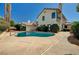 Backyard featuring a private pool, mature trees and plants and desert landscaping at 2917 Broken Willow Cir, Las Vegas, NV 89117