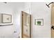 Bathroom featuring a modern shower, tasteful decor, and neutral cabinets at 3104 Waterview Dr, Las Vegas, NV 89117