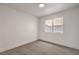 Bedroom showcasing neutral carpet, fresh paint, and a window at 3104 Waterview Dr, Las Vegas, NV 89117