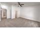 Spacious bedroom features fresh paint, ceiling fan, and neutral carpet at 3104 Waterview Dr, Las Vegas, NV 89117
