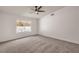 Bedroom featuring a window and neutral carpet at 3104 Waterview Dr, Las Vegas, NV 89117