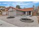Charming single-story home with a low-maintenance desert landscaped front yard and two car garage at 3104 Waterview Dr, Las Vegas, NV 89117
