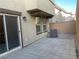 View of the private backyard with a paver patio and a block wall at 330 Silva Pl, Henderson, NV 89011
