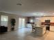 Well-lit open floor plan features a modern kitchen with stainless appliances at 330 Silva Pl, Henderson, NV 89011