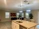 Cozy living room with sleek furniture and modern lighting fixtures at 330 Silva Pl, Henderson, NV 89011