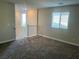 Bright loft space with neutral carpet, staircase and natural light from the windows at 330 Silva Pl, Henderson, NV 89011