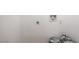Unfinished space with paint buckets, outlet access, and textured walls at 333 Rossmoyne Ave, North Las Vegas, NV 89030