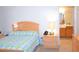 Bright bedroom with coordinated furniture, decor, and access to the bathroom at 3519 W Red Coach Ave, North Las Vegas, NV 89031