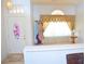 Bright entry with patterned glass door and view to carpeted area with side table at 3519 W Red Coach Ave, North Las Vegas, NV 89031