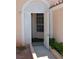 Front entrance featuring white security gate at 3519 W Red Coach Ave, North Las Vegas, NV 89031