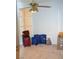 Bonus room currently used for storage with suitcases, file cabinet, and a window at 3519 W Red Coach Ave, North Las Vegas, NV 89031