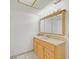 Bright bathroom featuring vanity with tile floors at 3753 Heritage Ave, Las Vegas, NV 89121