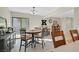 Dining area with a round table and access to a private patio at 3753 Heritage Ave, Las Vegas, NV 89121