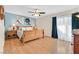 Serene primary bedroom featuring hardwood floors, soft natural light, and a relaxing atmosphere at 3753 Heritage Ave, Las Vegas, NV 89121
