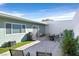 Enclosed patio features garden area, seating area, and grill for outdoor dining at 3753 Heritage Ave, Las Vegas, NV 89121