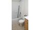 Bathroom with a bathtub and shower combination, tile flooring, toilet and vanity at 3995 Visby, Las Vegas, NV 89119