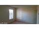 Bright living room featuring a window that allows natural light to fill the space at 3995 Visby, Las Vegas, NV 89119
